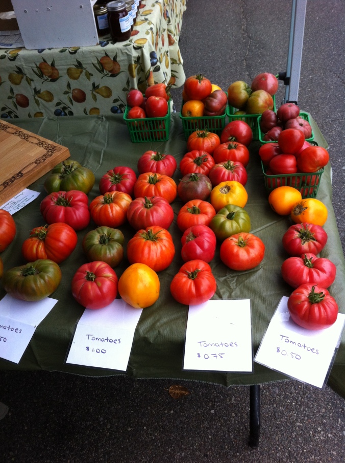 a table of multicoloured tomatoes